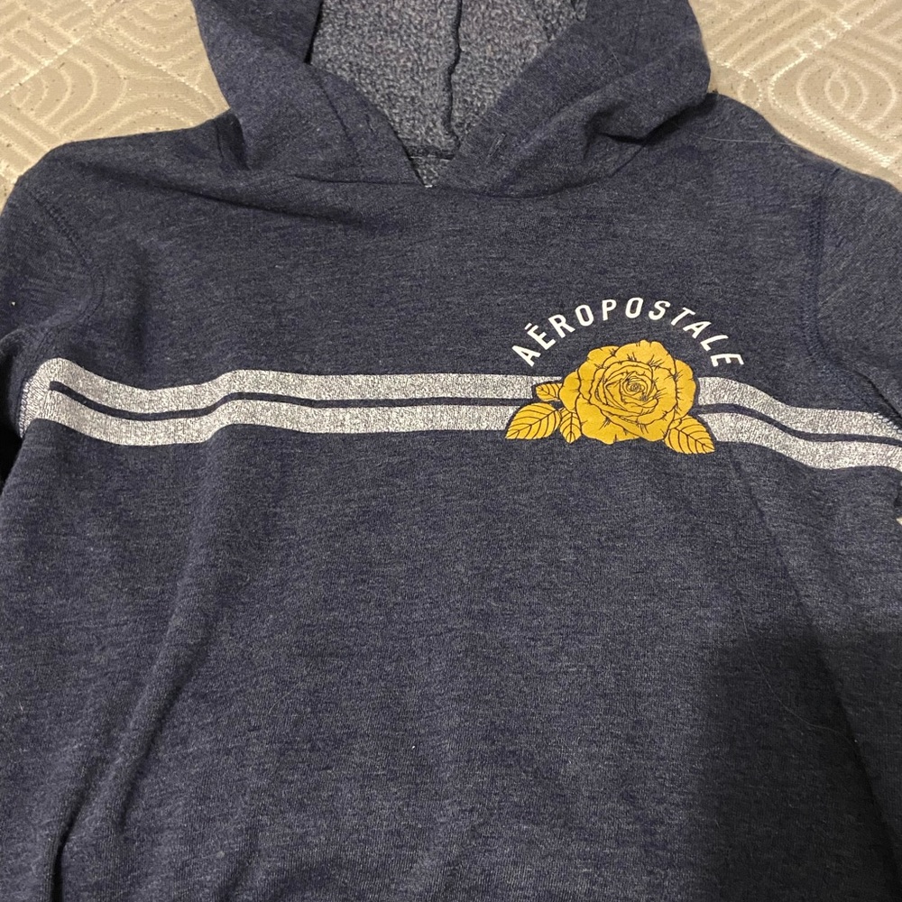 It’s a crop top hoodie it’s Aeropostale and it’s only been worn once or twice